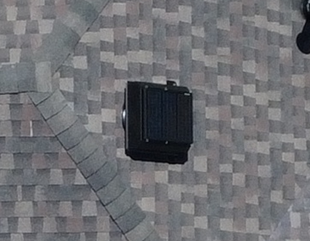 Attic Breeze solar attic fan installed on a Central Texas asphalt roof