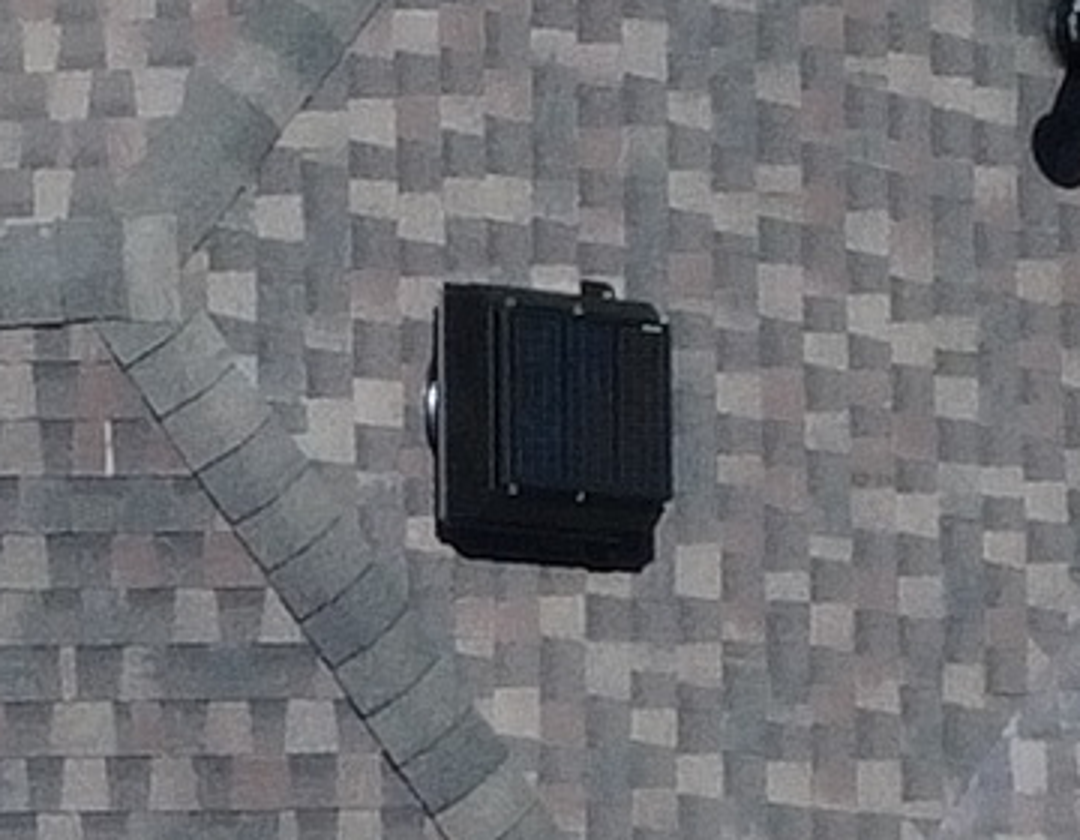 Attic Breeze solar attic fan installed on a Central Texas asphalt roof